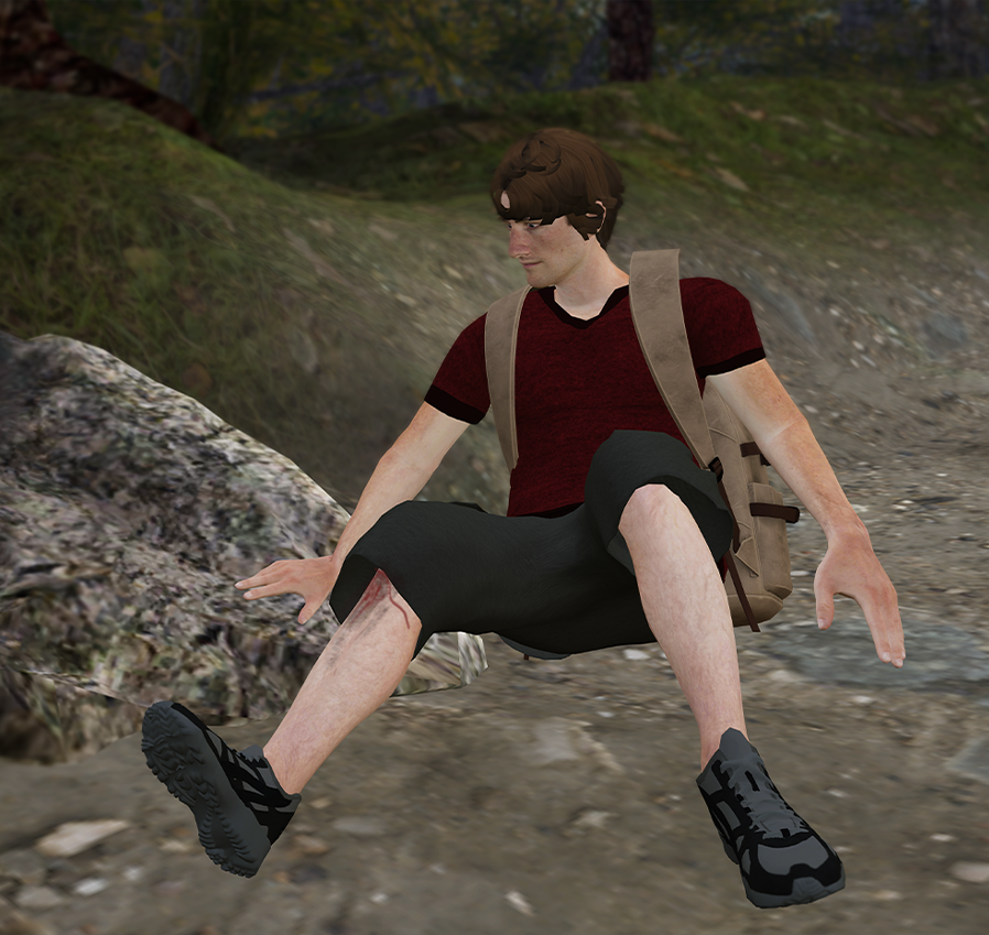 Chłopiec z rozciętą nogą znajdujący się w g&oacute;rach.