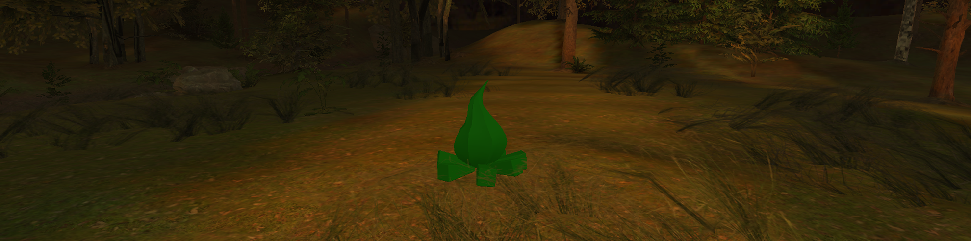 Płonące w lesie ognisko.