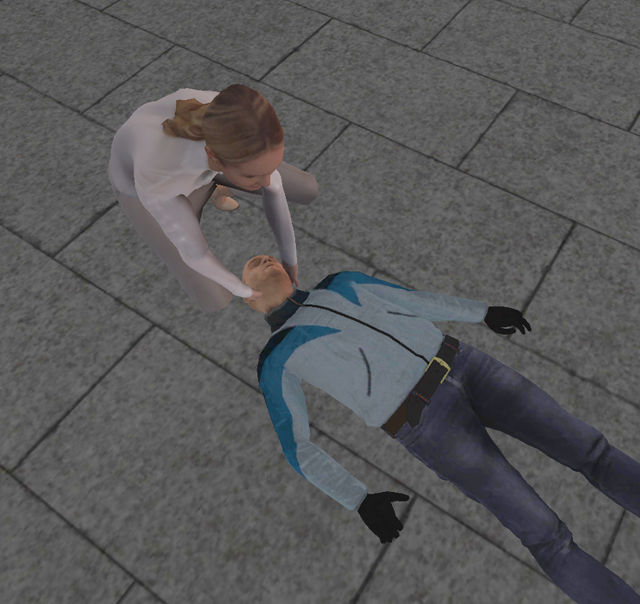 kobieta chroni glowe mezczyzny podczas ataku padaczki