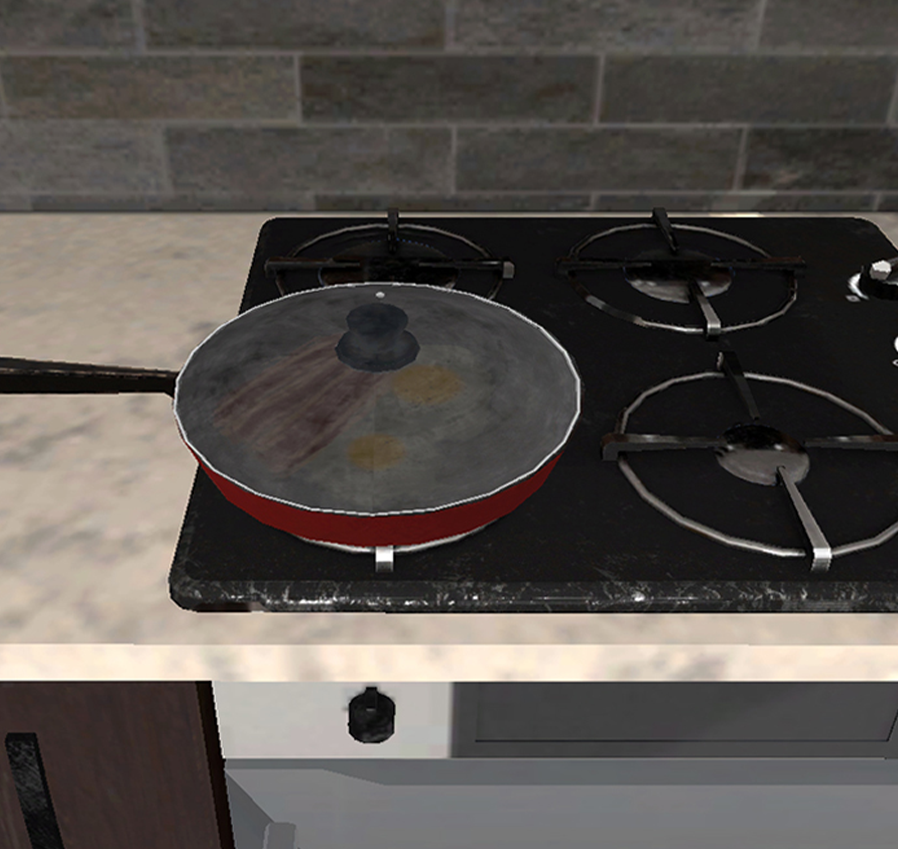 Patelnia z gorącym tłuszczem, na kuchence gazowej przykryta pokrywką.