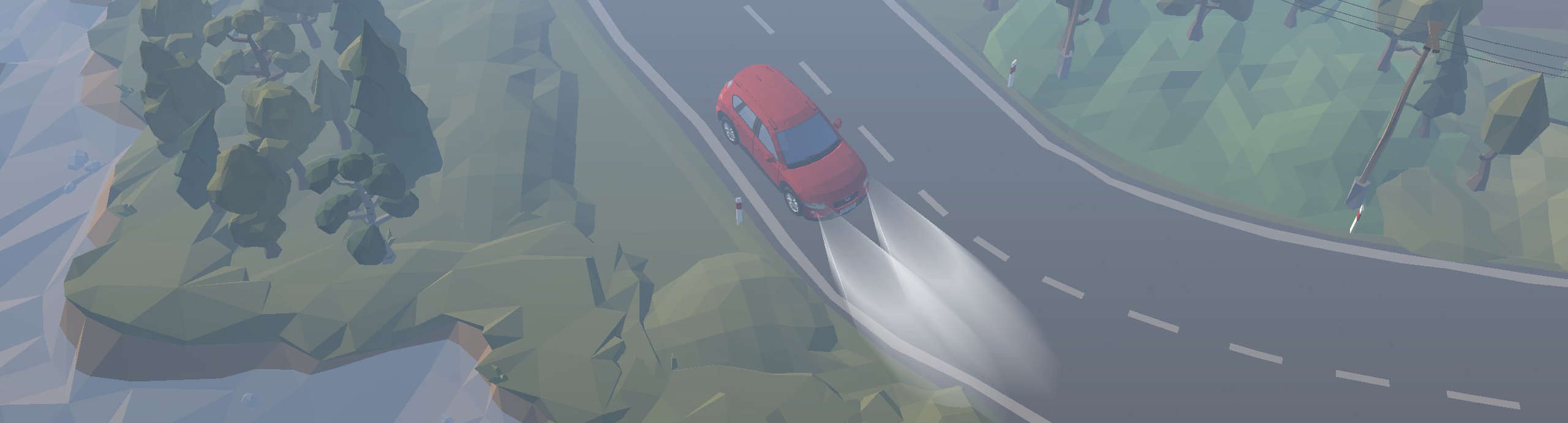 Samoch&oacute;d jadący we mgle.